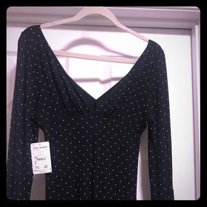 Black polka dot shirt